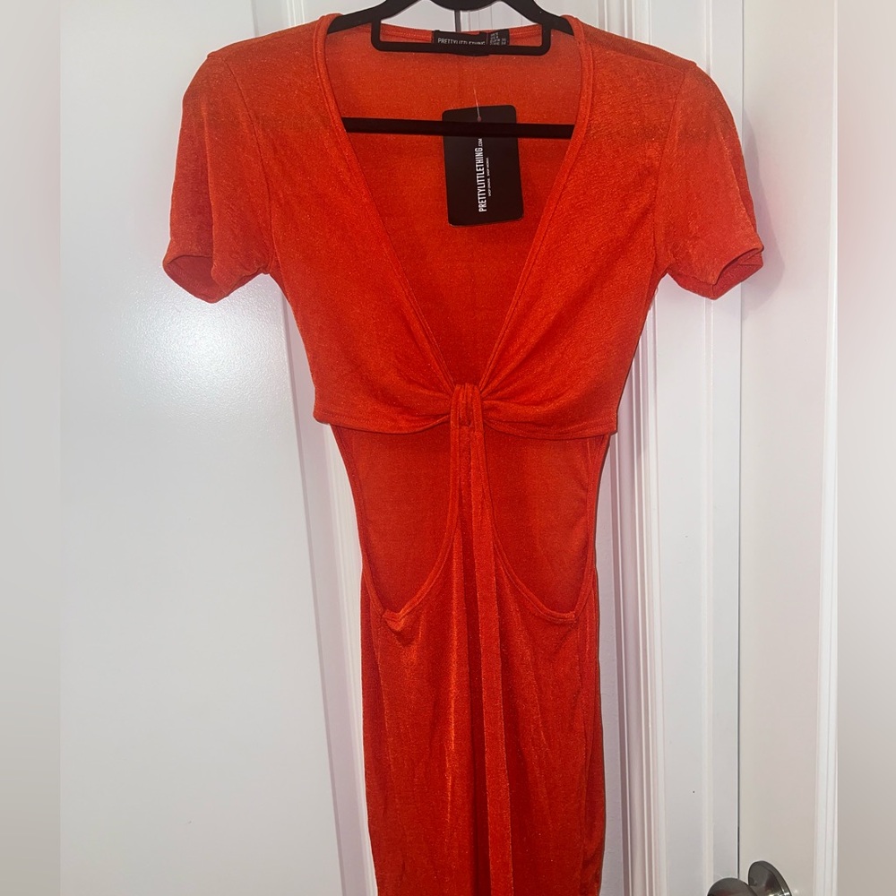 Orange cut out dress